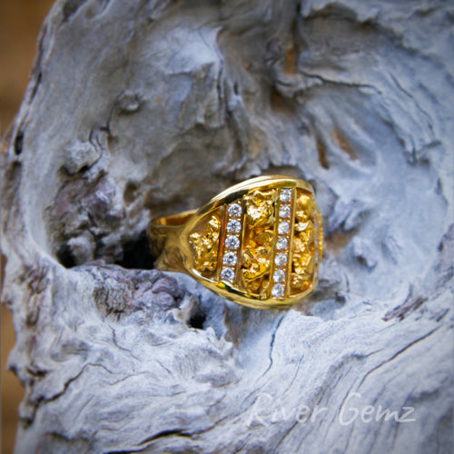 Gold and diamond ring design reminiscent of a weight lifter's prize belt.