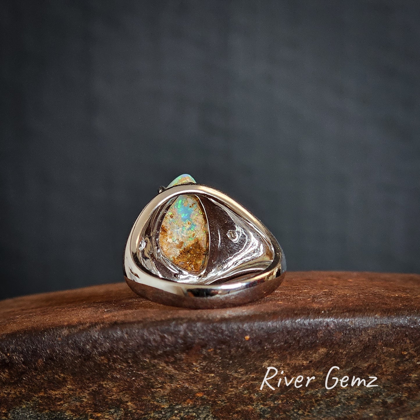 Back of the ring view shows the trace of ironstone of the boulder opal.