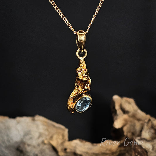 Aquamarine and gold nugget necklace.