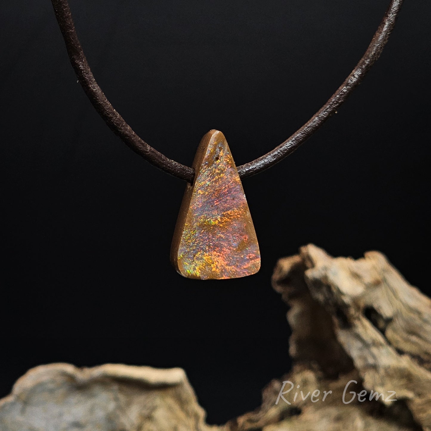 Fire coloured triangular shaped boulder opal necklace.