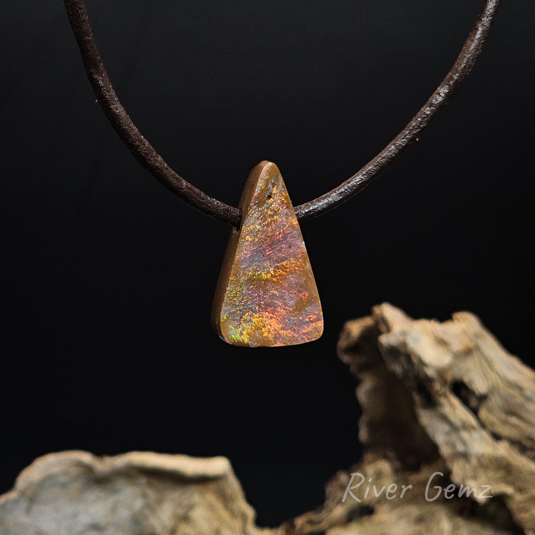 Fire coloured triangular shaped boulder opal necklace.