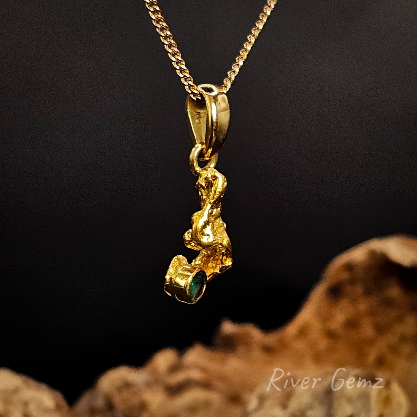 Side view of gold nugget pendant showing the large bail.