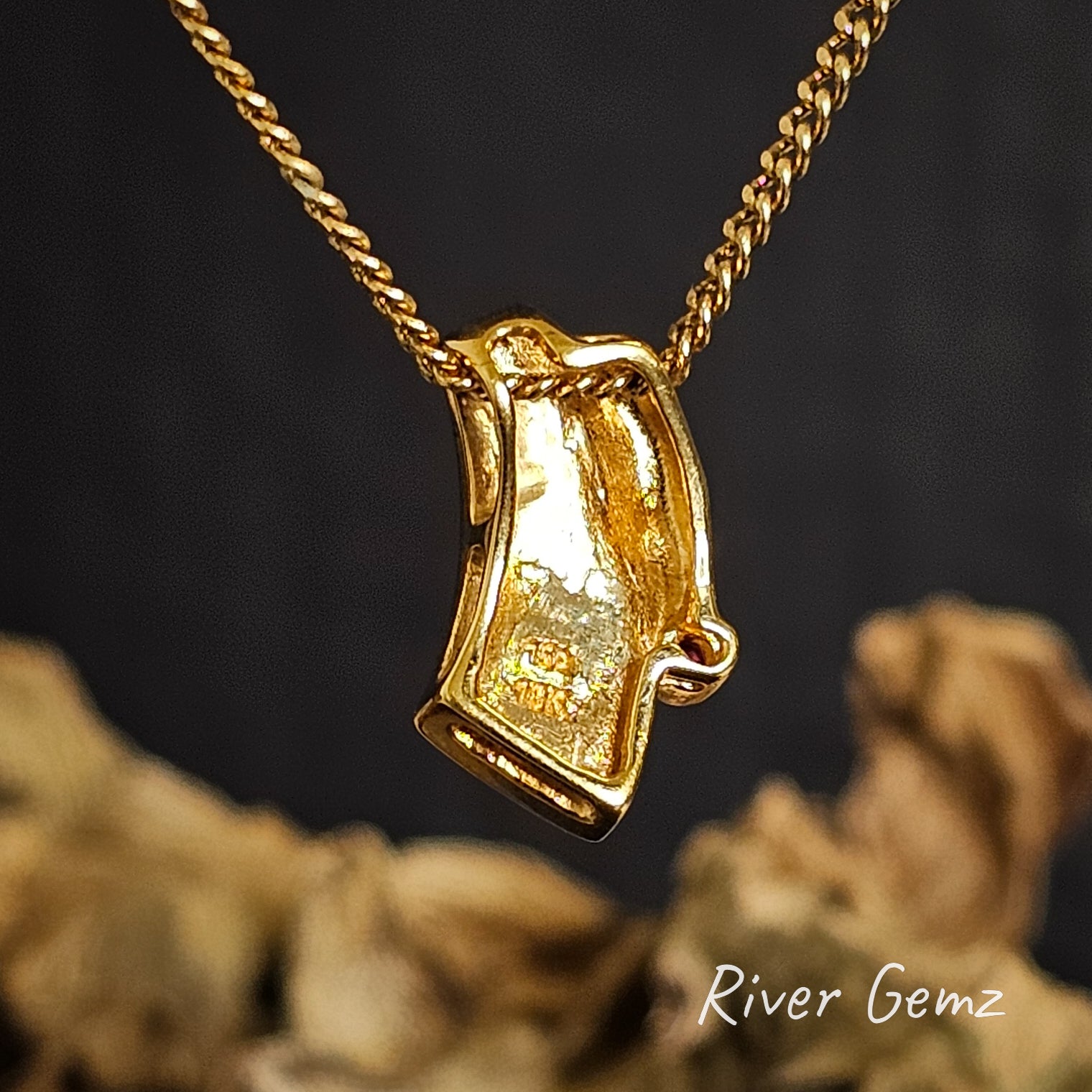 Back of the gold necklace shows the 18K stamp on a dark background with 'River Gemz' branding.