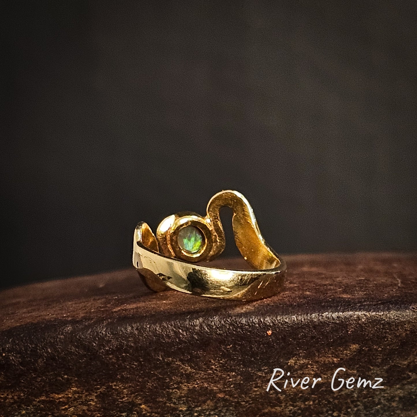 Back of gold ring shows the colour continues to be rear of the crystal opal.