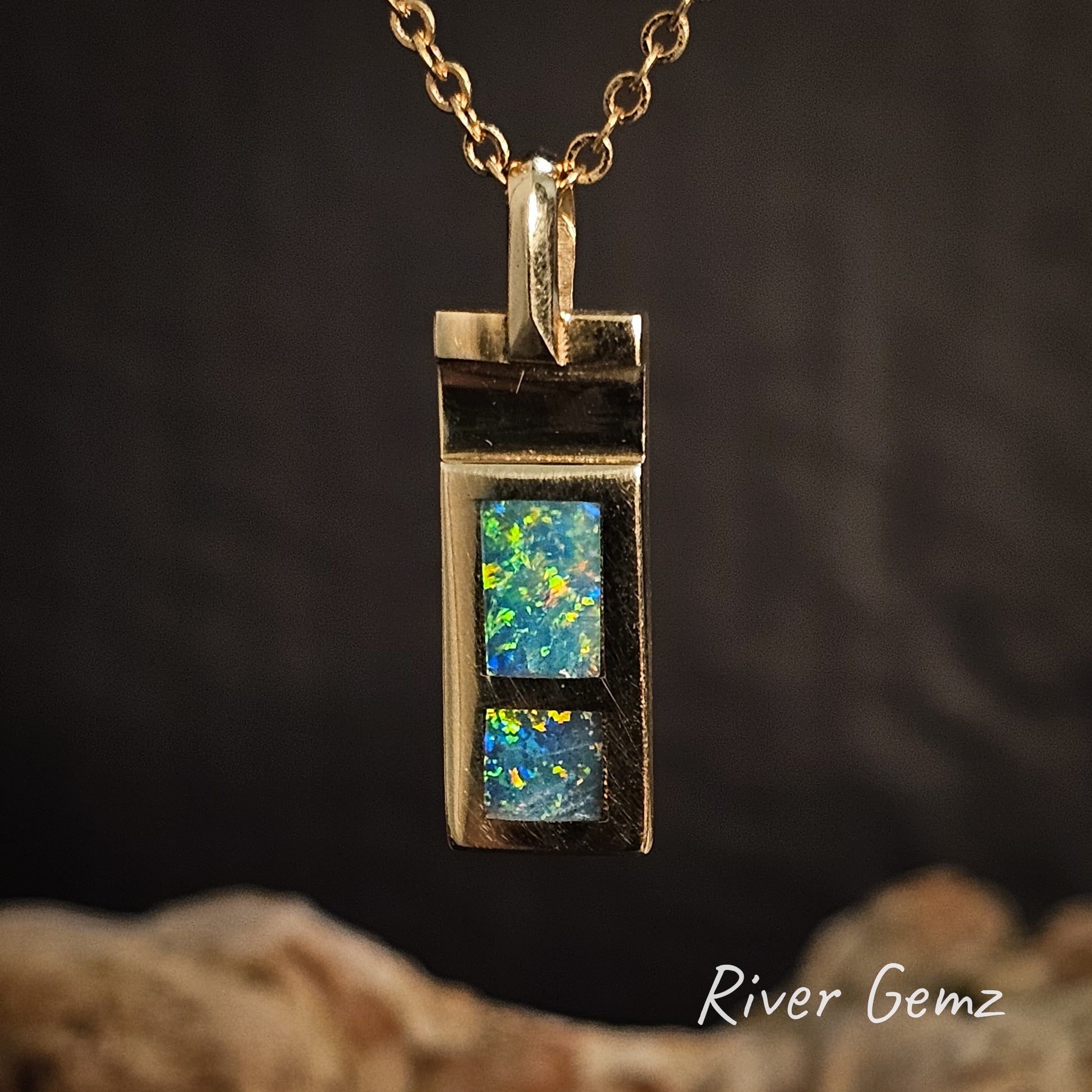Opal pendant necklace on a dark background with 'River Gemz' branding.