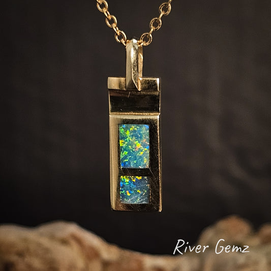 Opal pendant necklace on a dark background with 'River Gemz' branding.