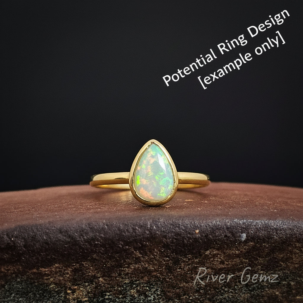 Crystal opal stone shown in a yellow gold ring design.