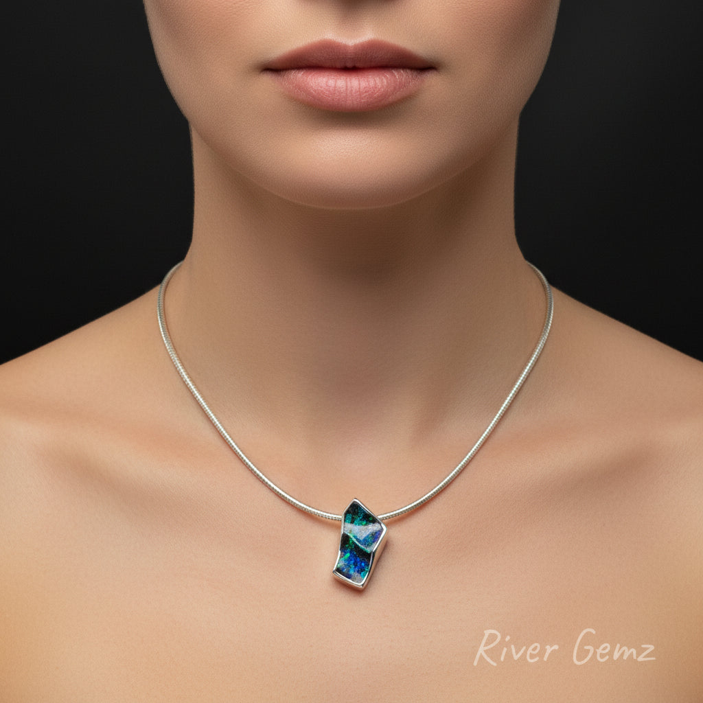 Opal pendant necklace modelled on a young lady.