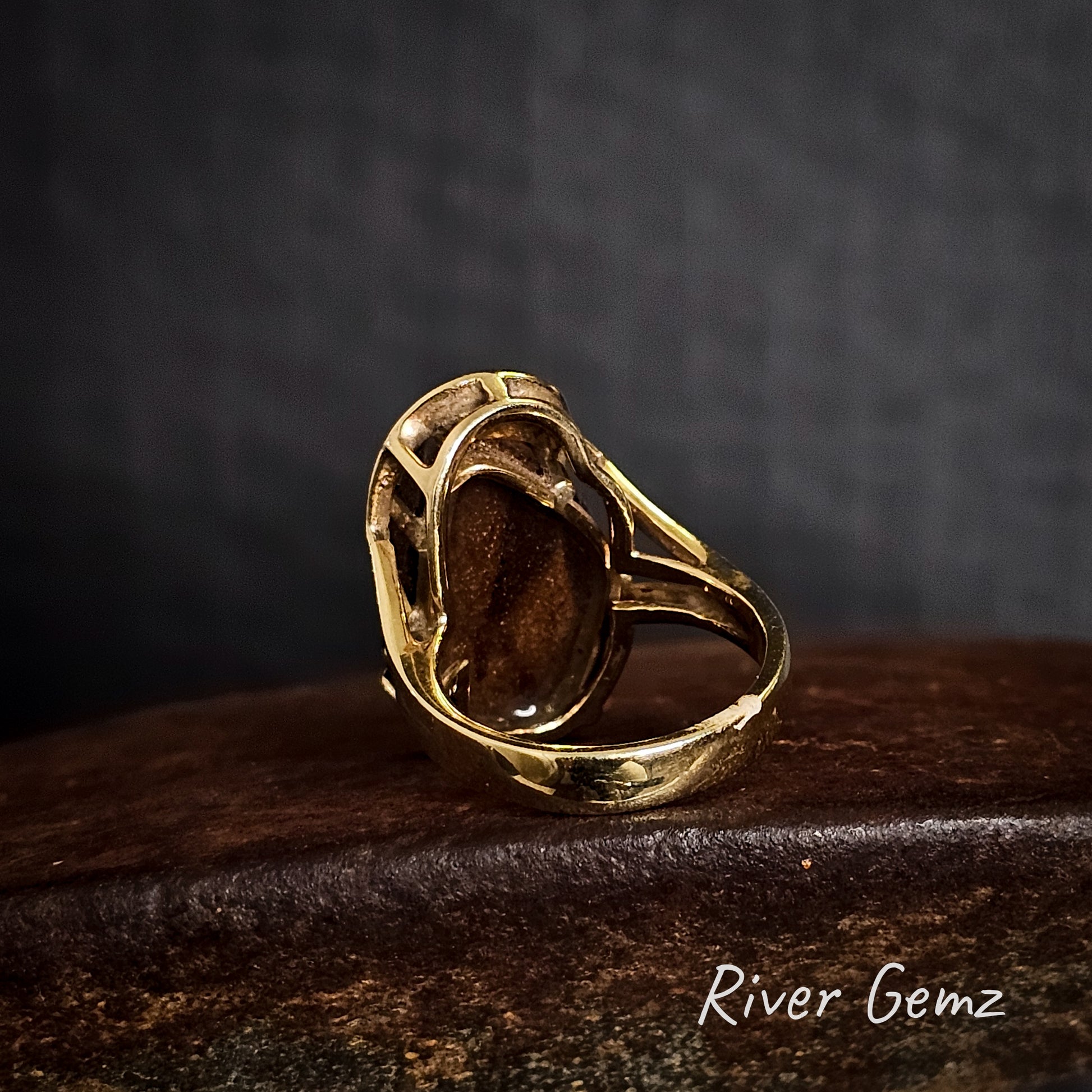 Rear view of the ring shows the ironstone matrix of the boulder opal.