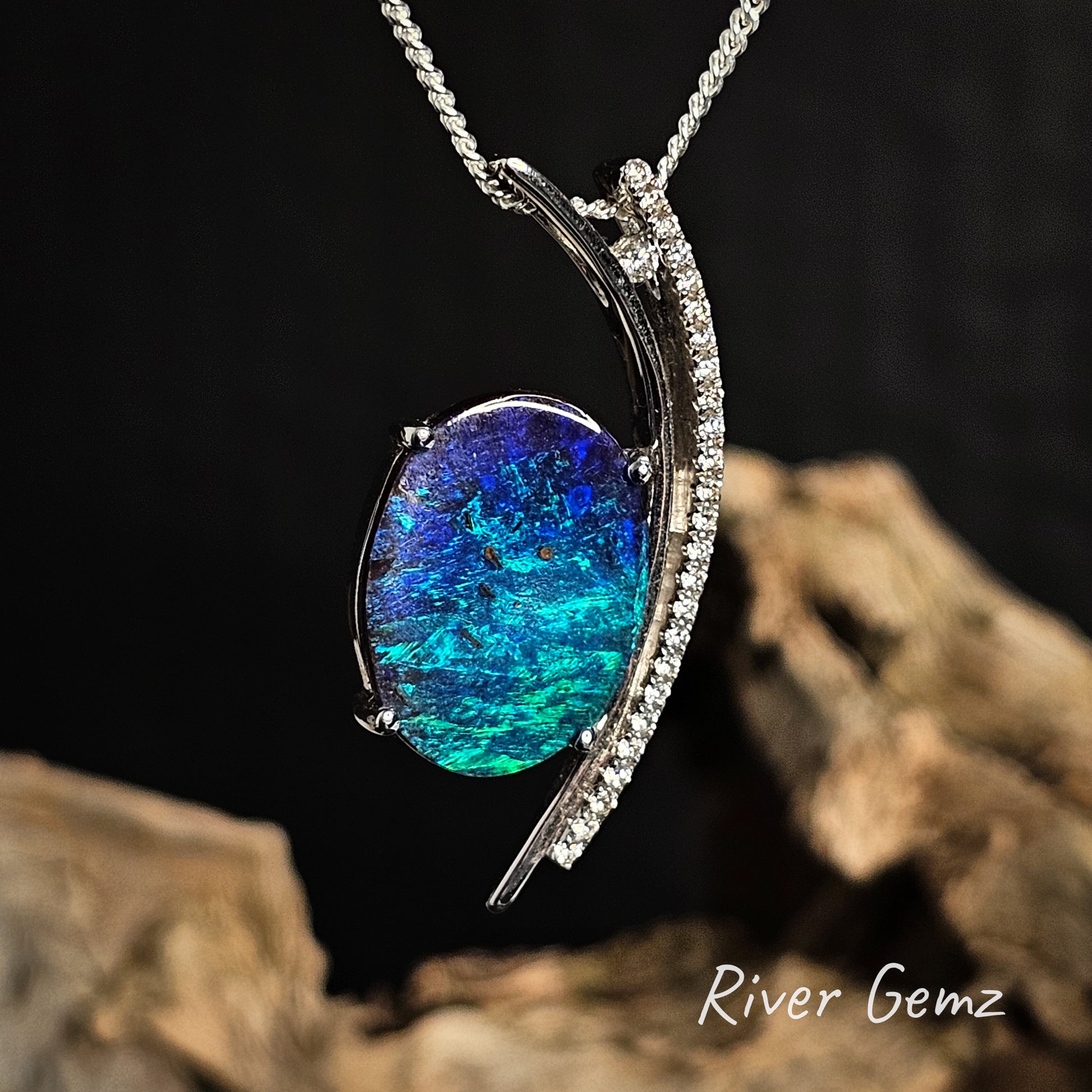 Opal pendant necklace with a dark background and 'River Gemz' branding.