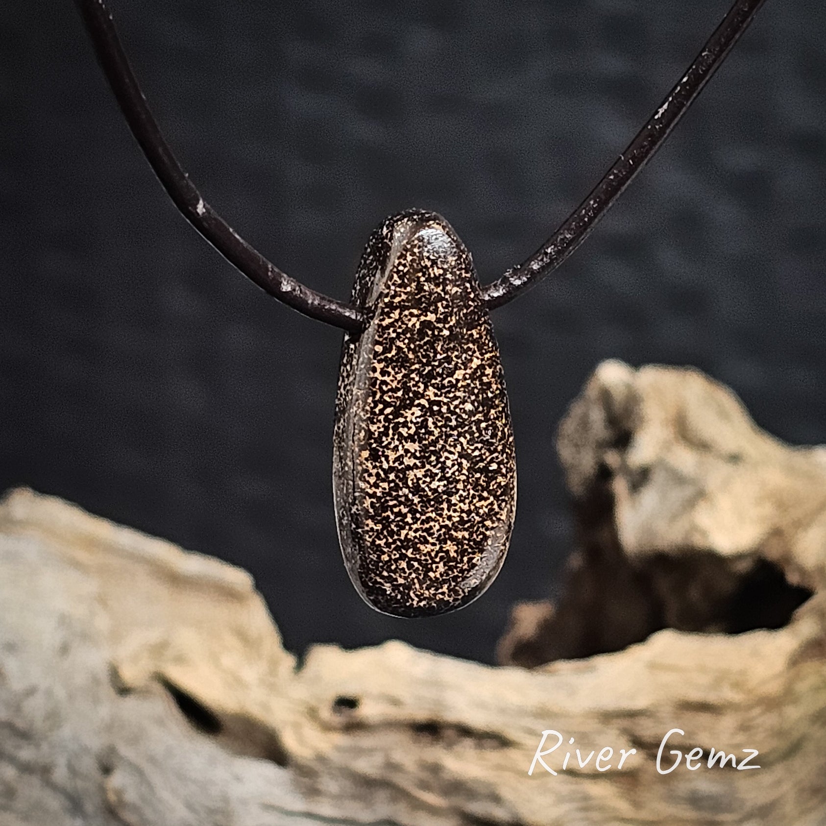 Rear view of the stone showing the iron matrix of the boulder opal.