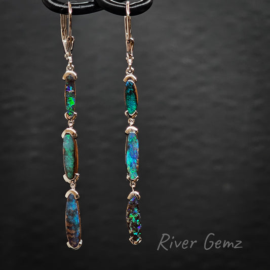 Long sterling silver danglies with 3 oval-shaped blue and green boulder opals.