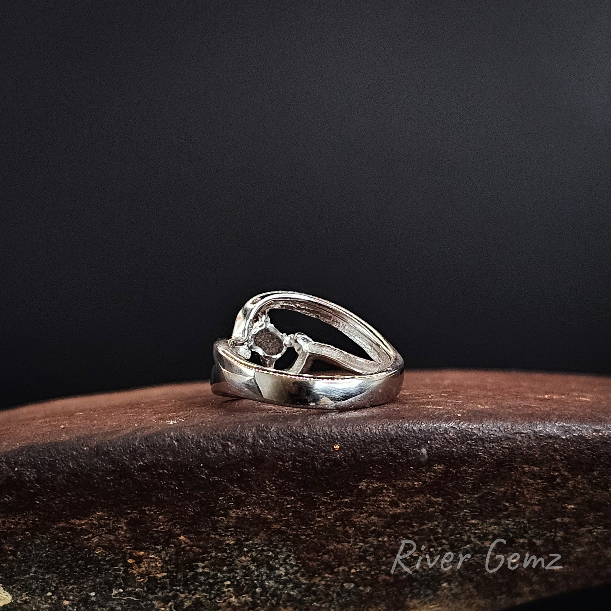 Rear view of silver ring showing the ironstone matrix of the boulder opal. The brand name 'River Gemz' is visible as a watermark in the bottom right corner.