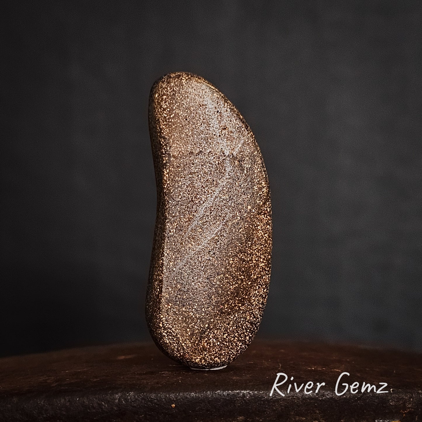 Back of stone showing the ironstone matrix of the boulder opal.