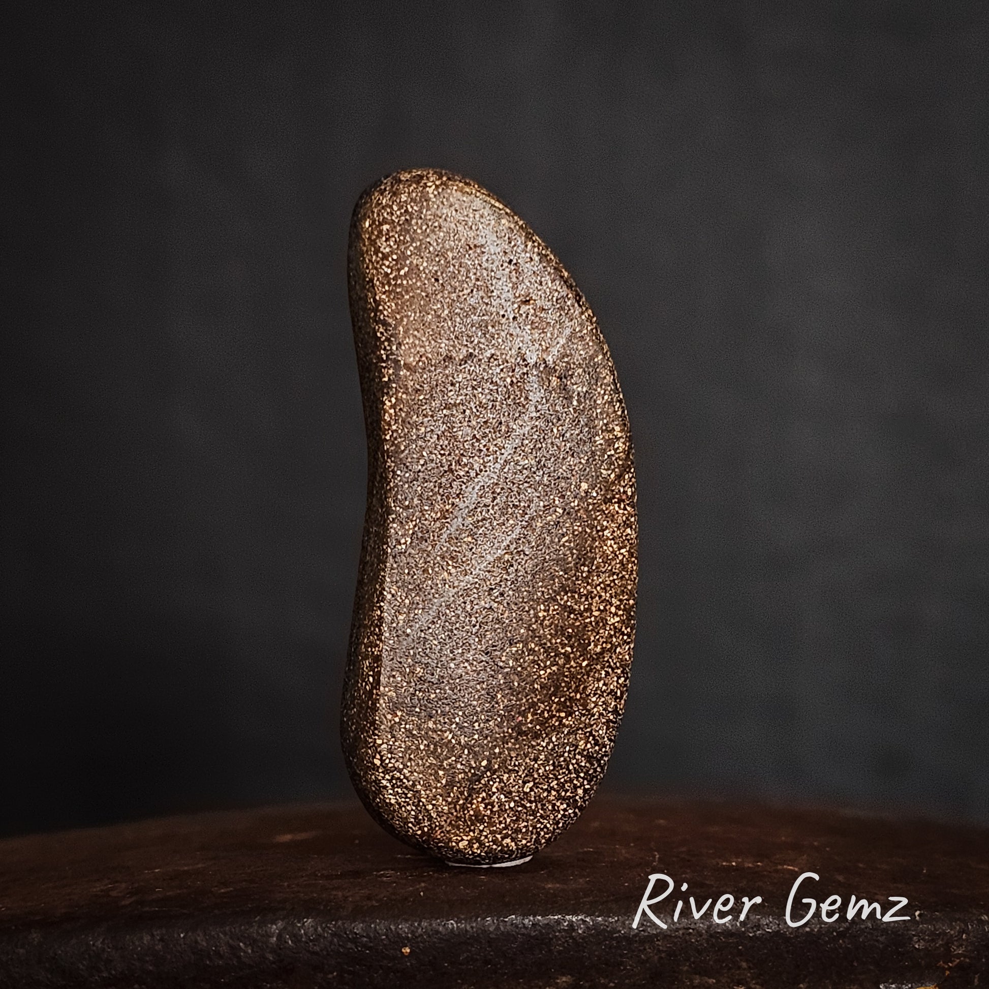 Back of stone showing the ironstone matrix of the boulder opal.