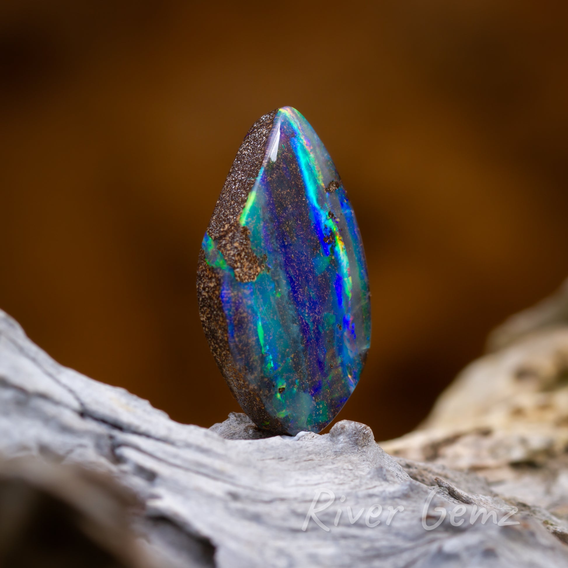 A slightly side view of opal showing the ironstone of the boulder opal.