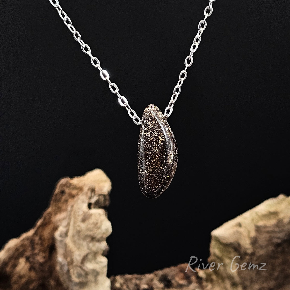 Rear view of the necklace shows the ironstone matrix of the boulder opal.