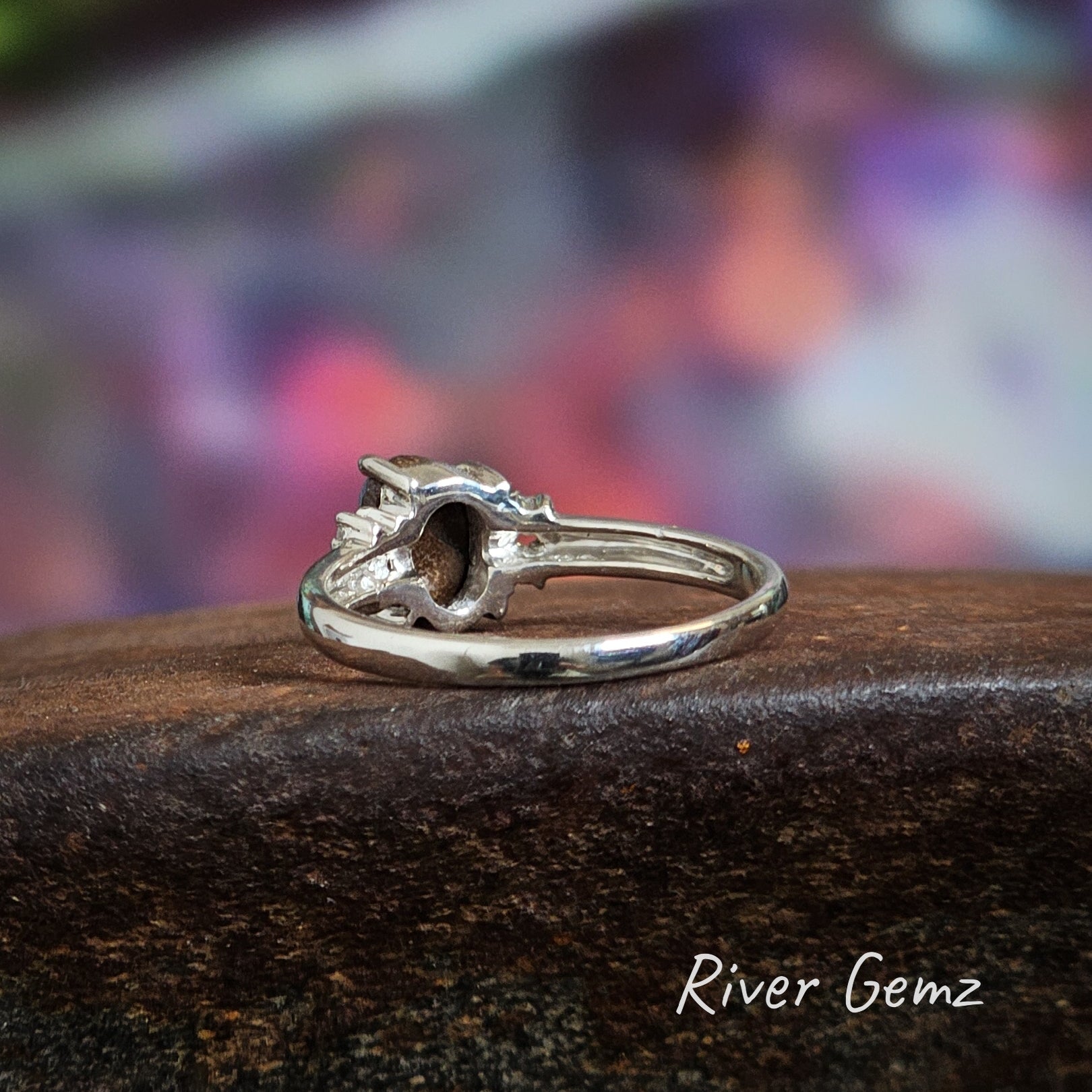 Rear view of the boulder opal ring showing the ironstone hose of the opal.