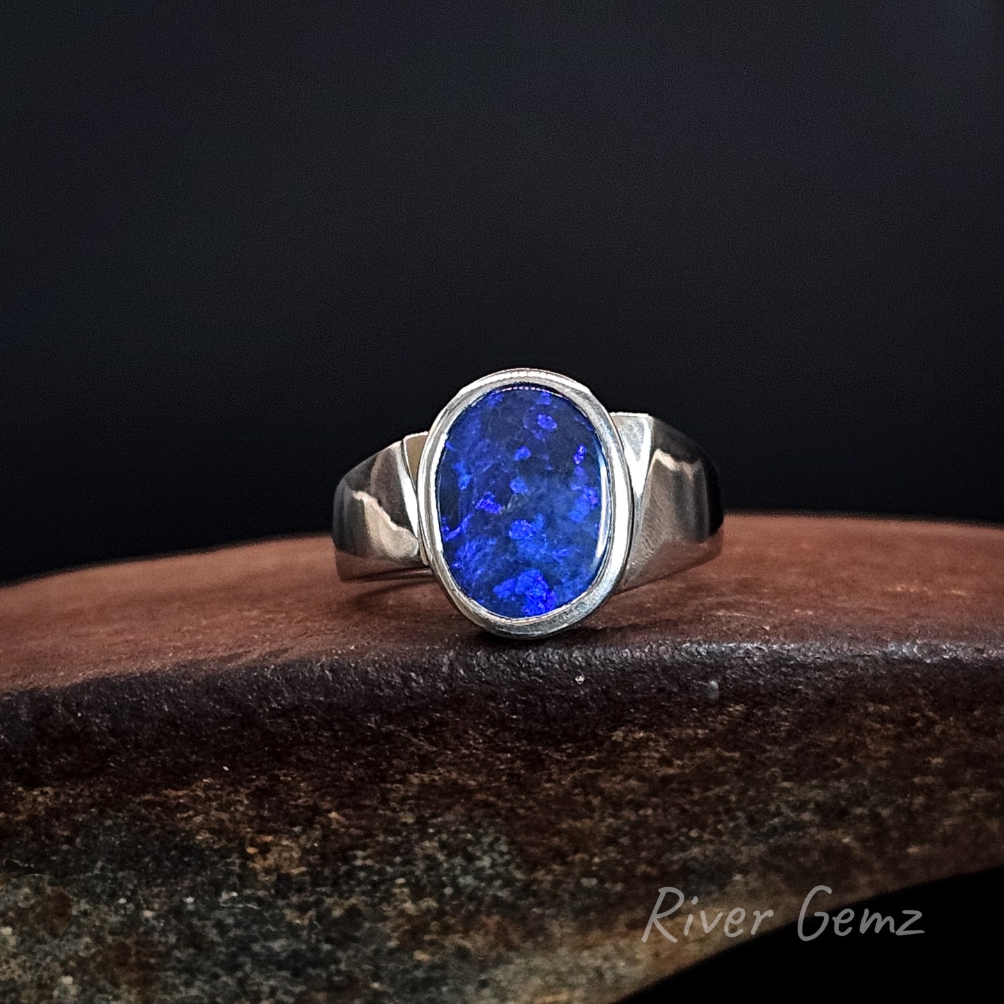 Front view shows the unequal width of the shoulders in the sterling silver ring.
