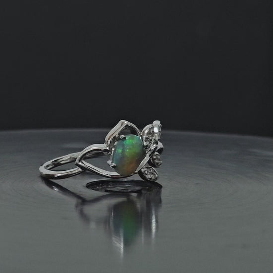 Video of opal silver ring rotating 270 degrees.