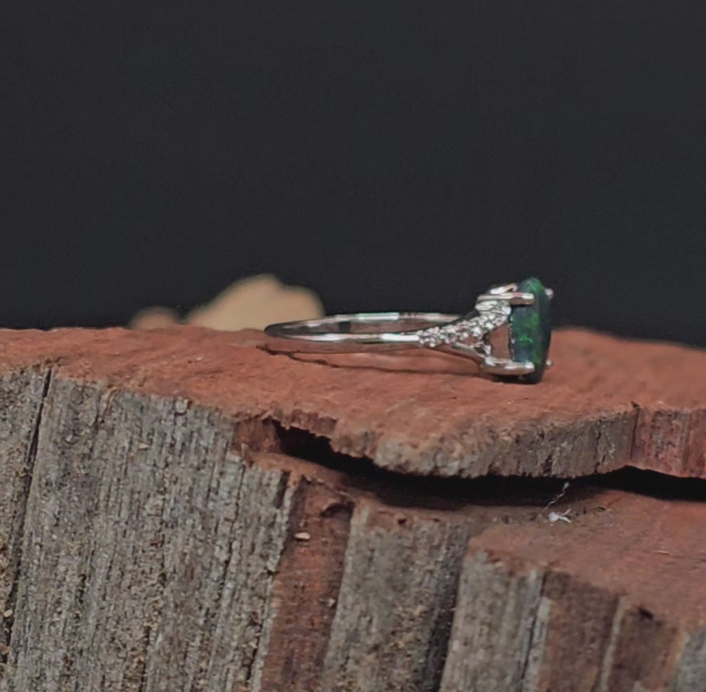Video showing the black opal sterling silver ring rotate to reveal 200 degree view.