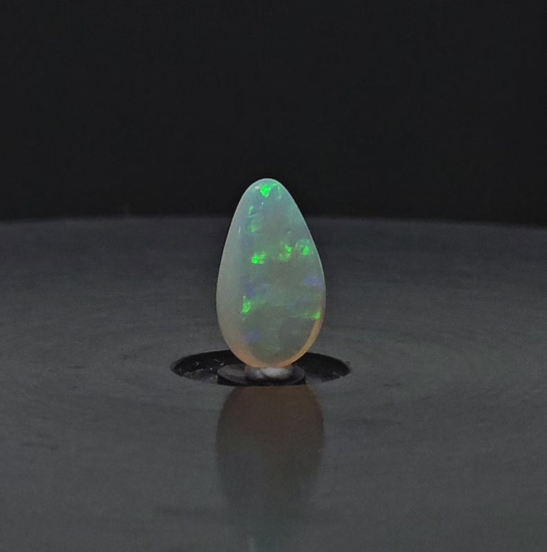 300 degree rotation video of solid opal standing upright.