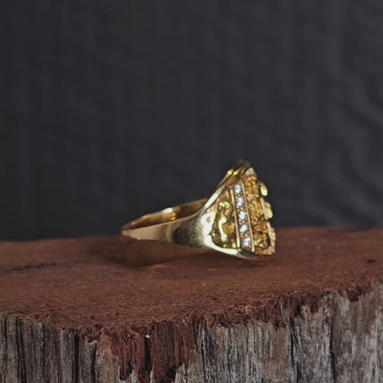 Video showing large nugget and diamond ring rotate 180 degrees.