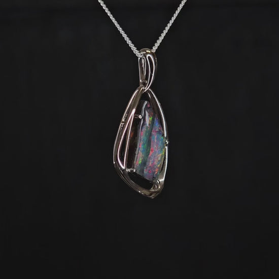 Dark opal with bright colours in white gold modern design necklace.