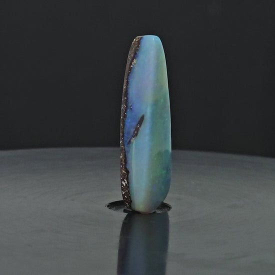 Video showing 270 degree rotation of opal standing upright.