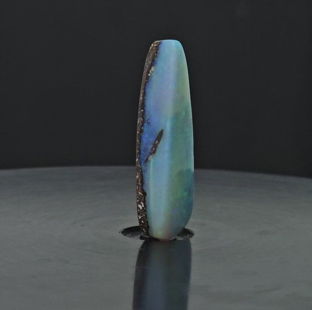 Video showing 270 degree rotation of opal standing upright.