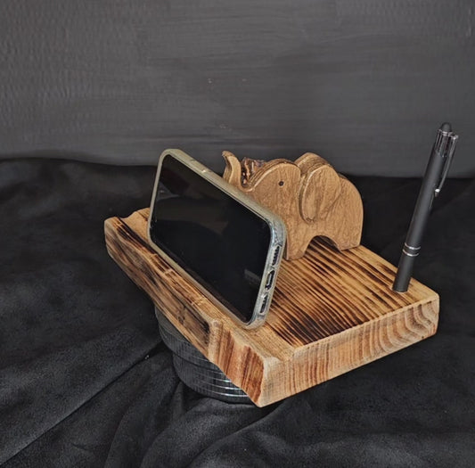 Video showing gold elephant phone-tablet  stand with a phone rotate.
