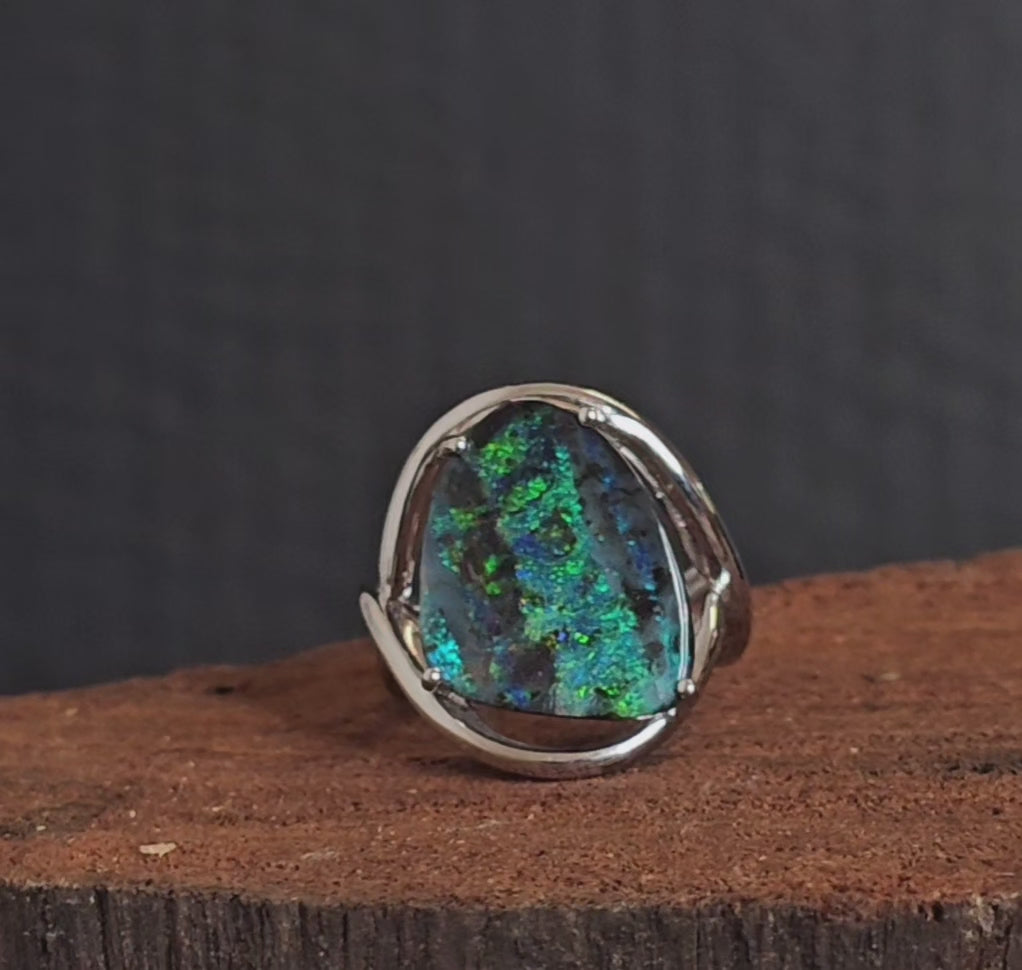 Video showing the white gold and boulder ring rotate 180 degrees.