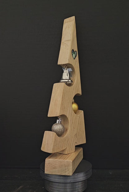 Video showing the small wooden Christmas tree rotating to show a 360 degree view.