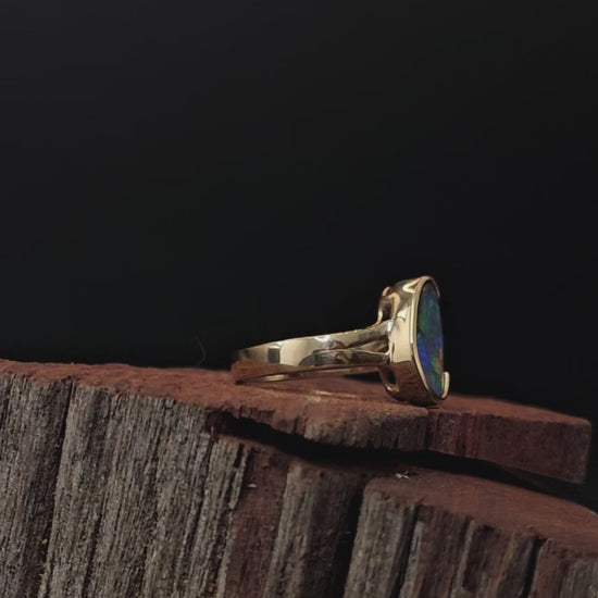 Video showing the boulder opal in gold ring rotate to reveal 200 degree view.