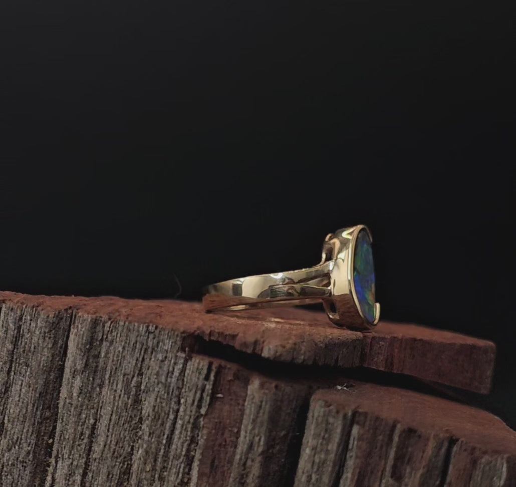 Video showing the boulder opal in gold ring rotate to reveal 200 degree view.