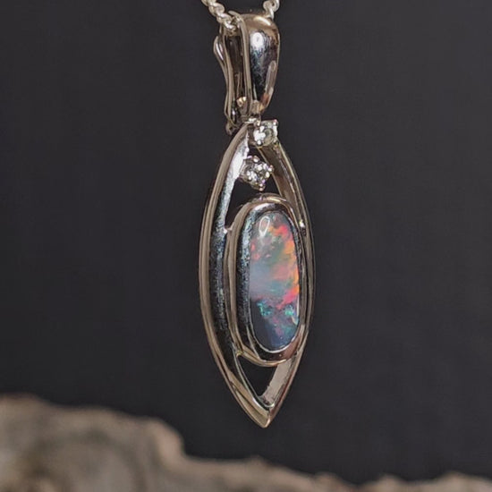Video showing 360 degree view of the opal silver pendant.