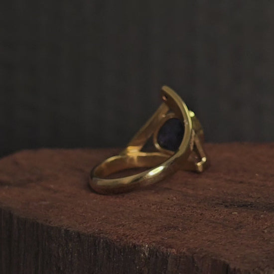 Video showing the diamonds and opal gold ring rotate 180 degrees.